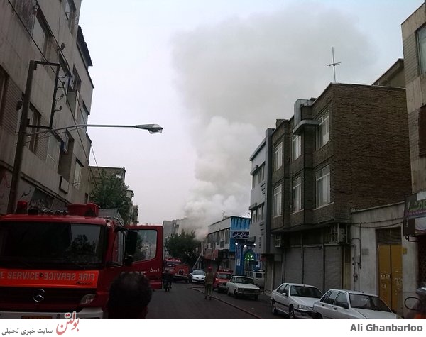 نجات معجزه آسای کارگر جوان محبوس در میان آتش+عکس